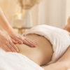 Gentle self lymphatic drainage massage on abdomen for detox and lymph circulation