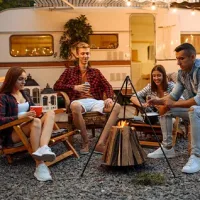 Friends campfire outdoor camping relaxing lifestyle - healthy active supplement